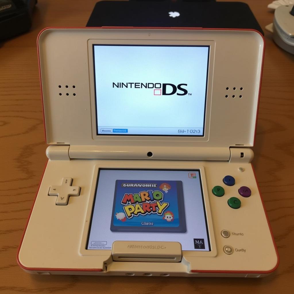 Nintendo DS console with Mario Party DS Game Card